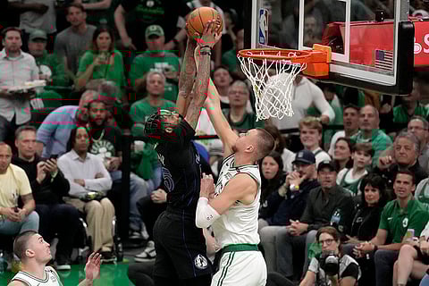 Boston Celtics Kristaps Porzingis blocks a shot